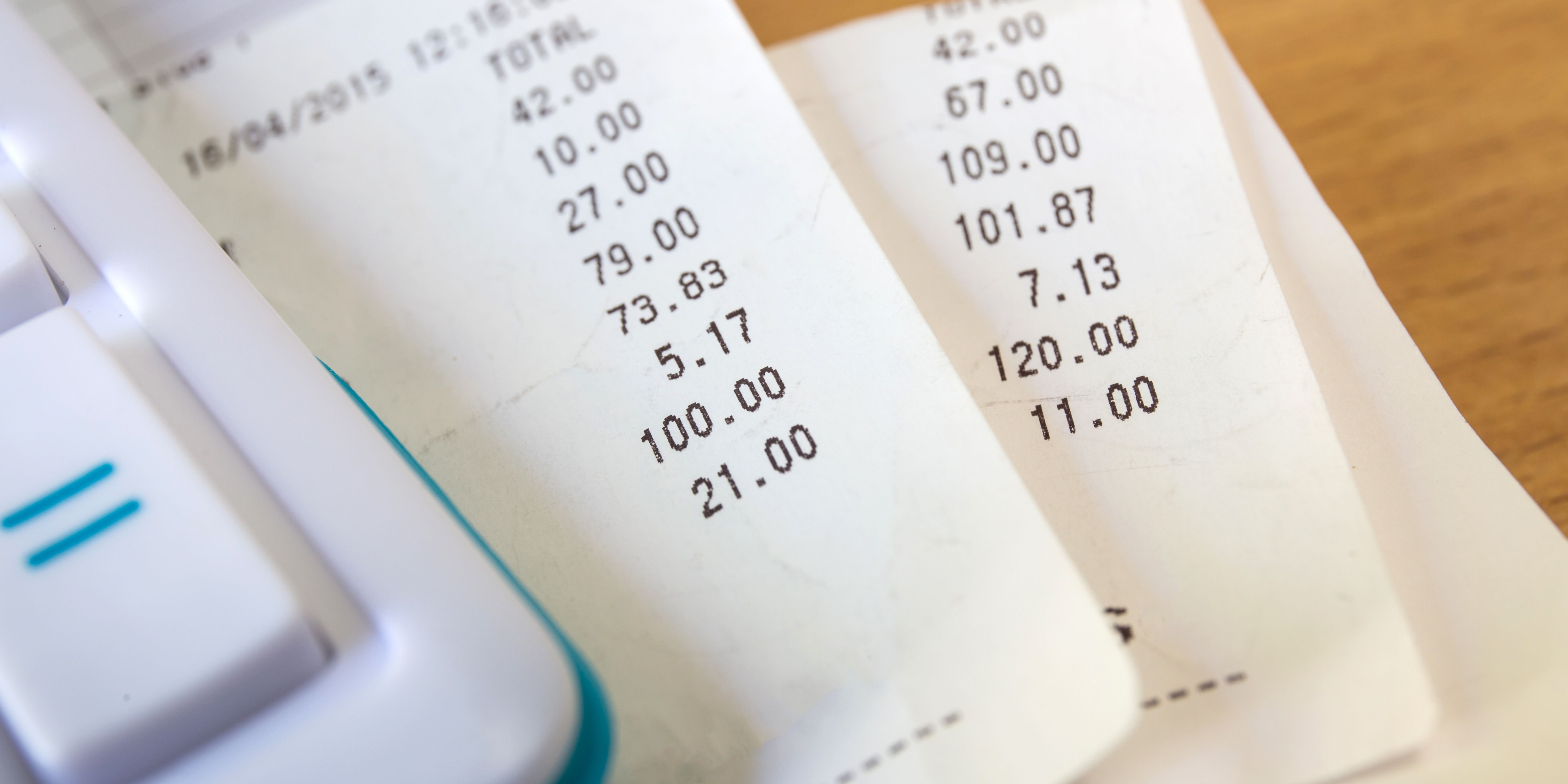 receipt paper and a calculator